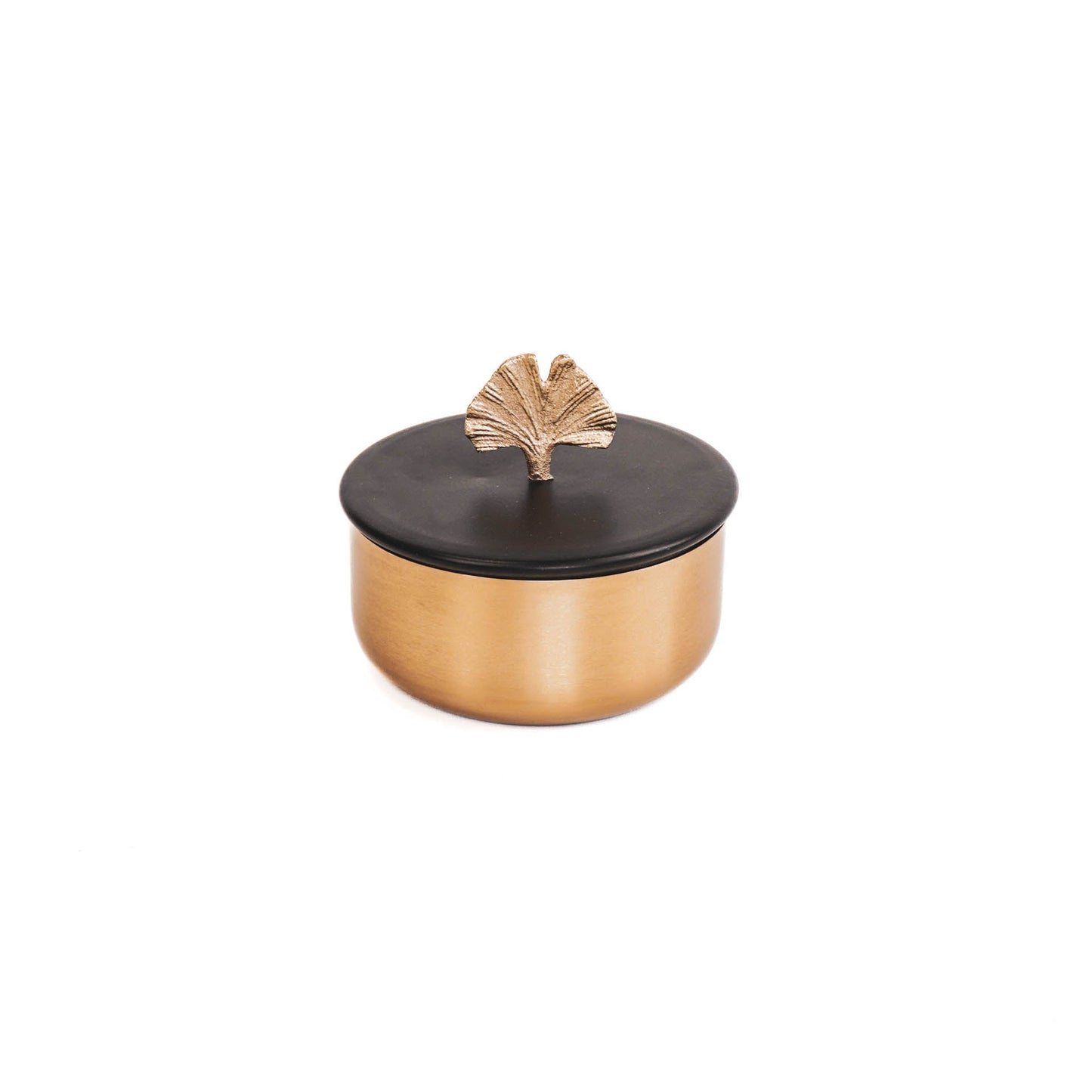 Gouden sierpotje met zwarte deksel met gouden gingko blad